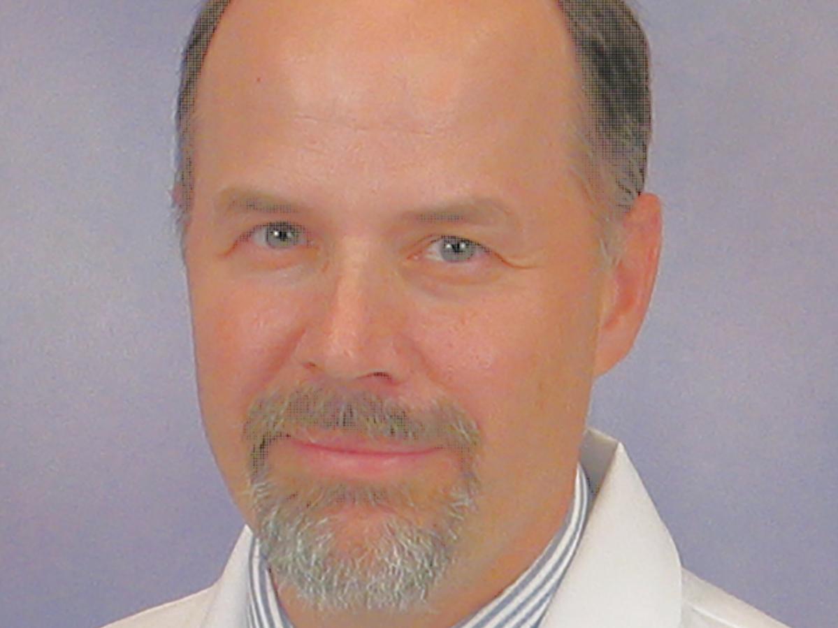 Daniel E. Brewer MD