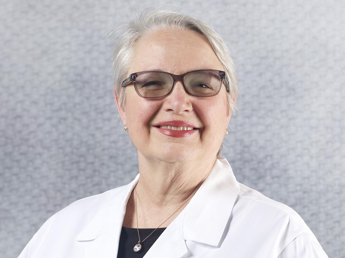 Tina M. Dudney MD