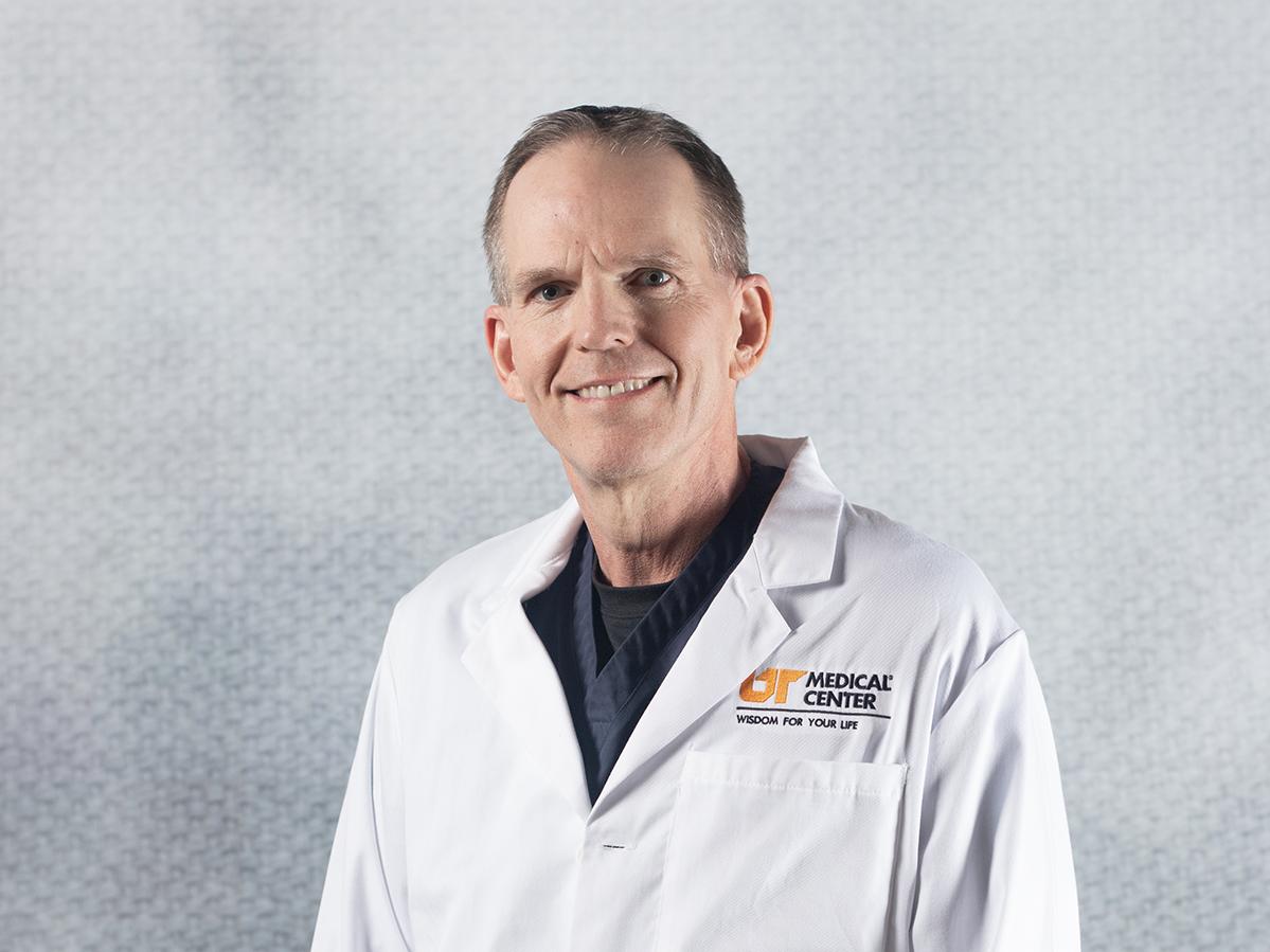 Douglas E. Holland, MD