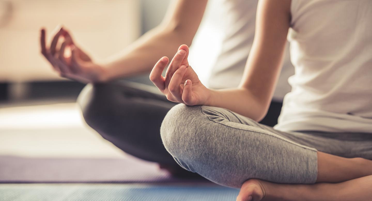 Two people meditating