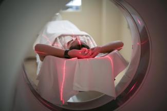 Patient going through an MRI machine