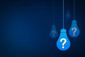 Light blue light bulb vectors white question marks on them against a dark blue background