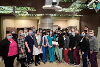 Radiation Oncology team with accreditation certificate