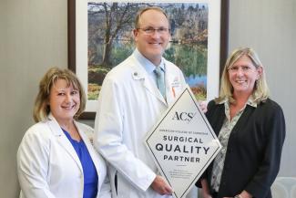 University Bariatric Center team members pose with Surgical Quality Partner sign