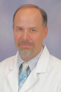 Daniel E. Brewer MD