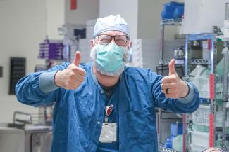 A certified nursing tech (CST) in the operating room