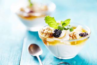 greek yogurt and granola in a bowl