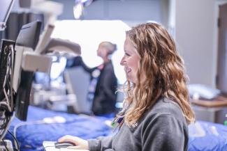 Neuroscience nurses working at computers