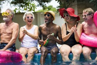 A group of seniors have fun at a pool party