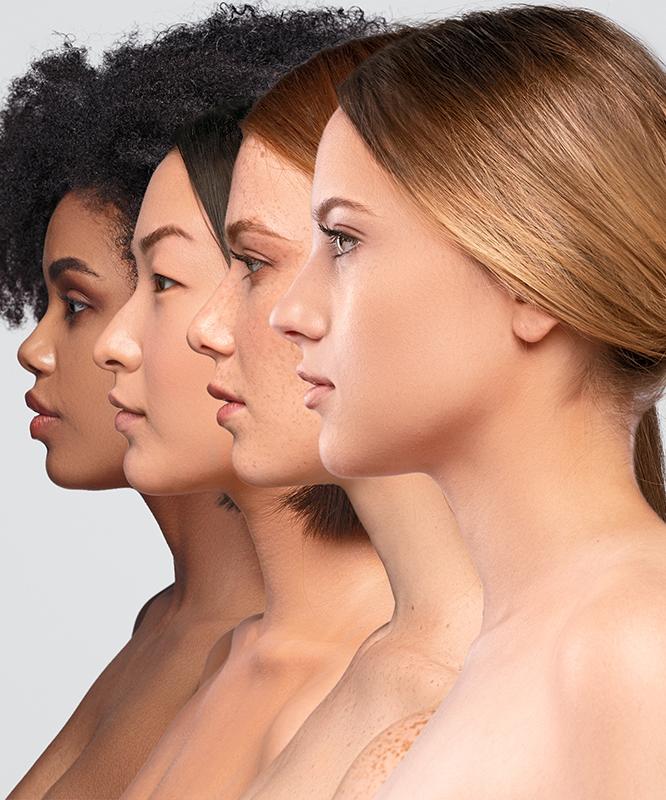 Four women of different races in profile
