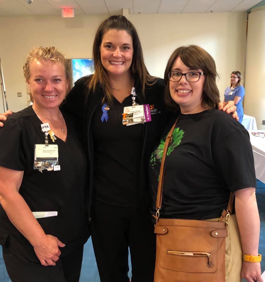 Emily Gilstorff with two of the nurses who tended her during her month at UT Medical Center